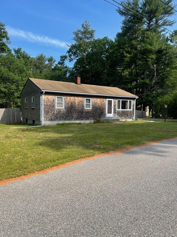 2 Helen Street Wareham, MA 02576 - Photo 2 of 24 a view of a house with a yard and garage