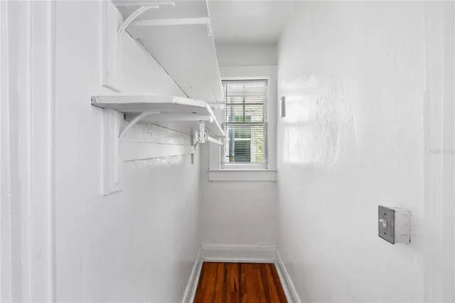 a view of walk in closet with window