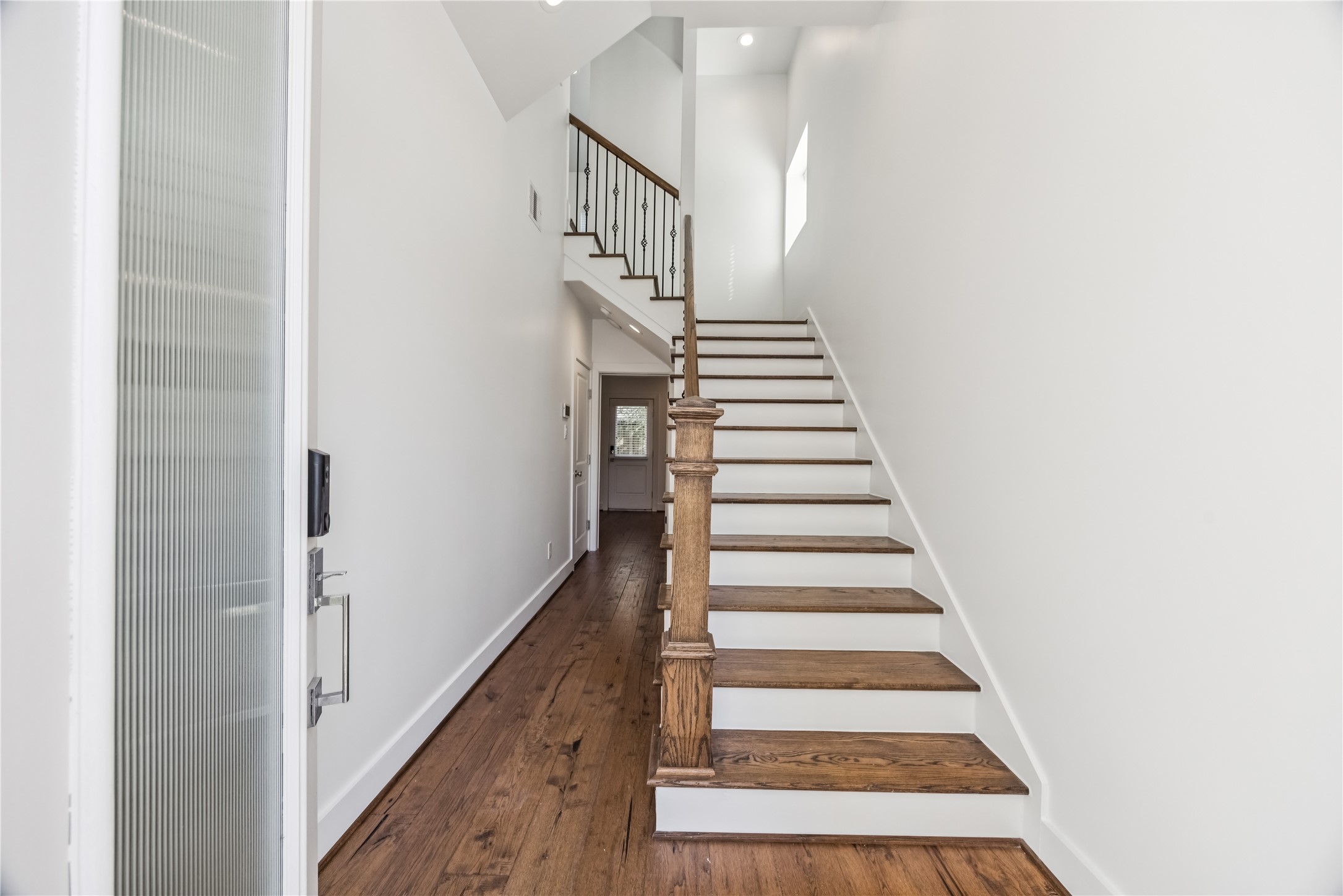 1812 West Webster Street Houston, TX 77019 - Photo 2 of 23 a view of entryway with wooden floor