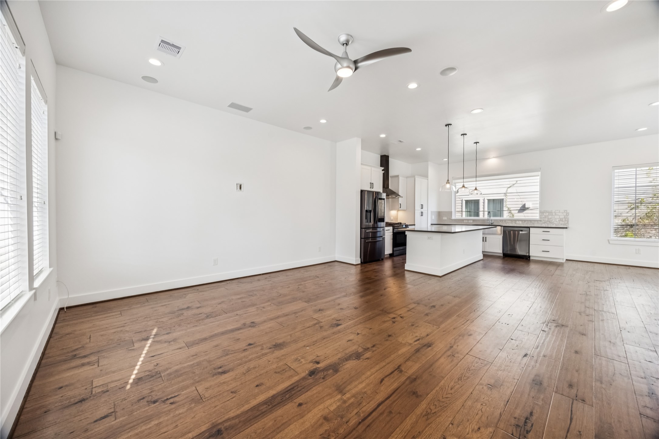 1812 West Webster Street Houston, TX 77019 - Photo 7 of 23 a view of kitchen with wooden floor and window