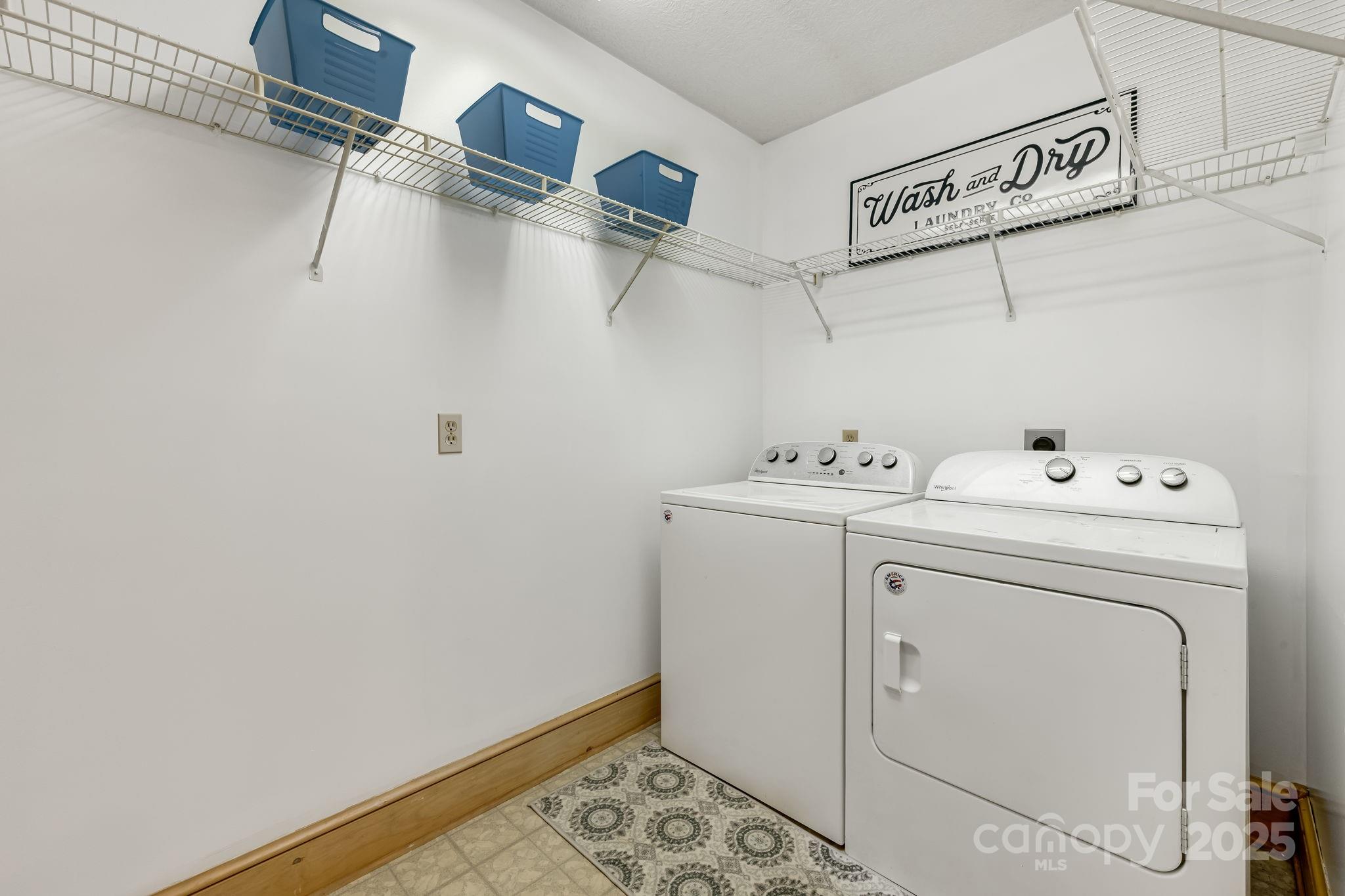 57 Stillwater Springs Road Burnsville, NC 28714 - Photo 25 of 48 a utility room with dryer and washer