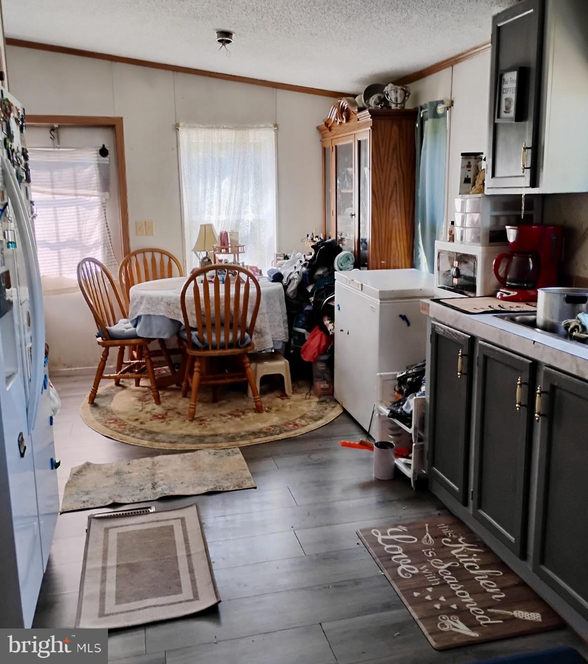 10363 James River Road Shipman, VA 22971 - Photo 3 of 7 Cozy kitchen with dining area charm.
