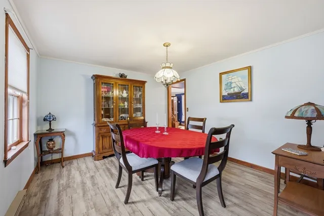 a kitchen with granite countertop a sink and cabinets