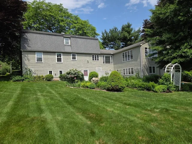 a flower plants in front of a house