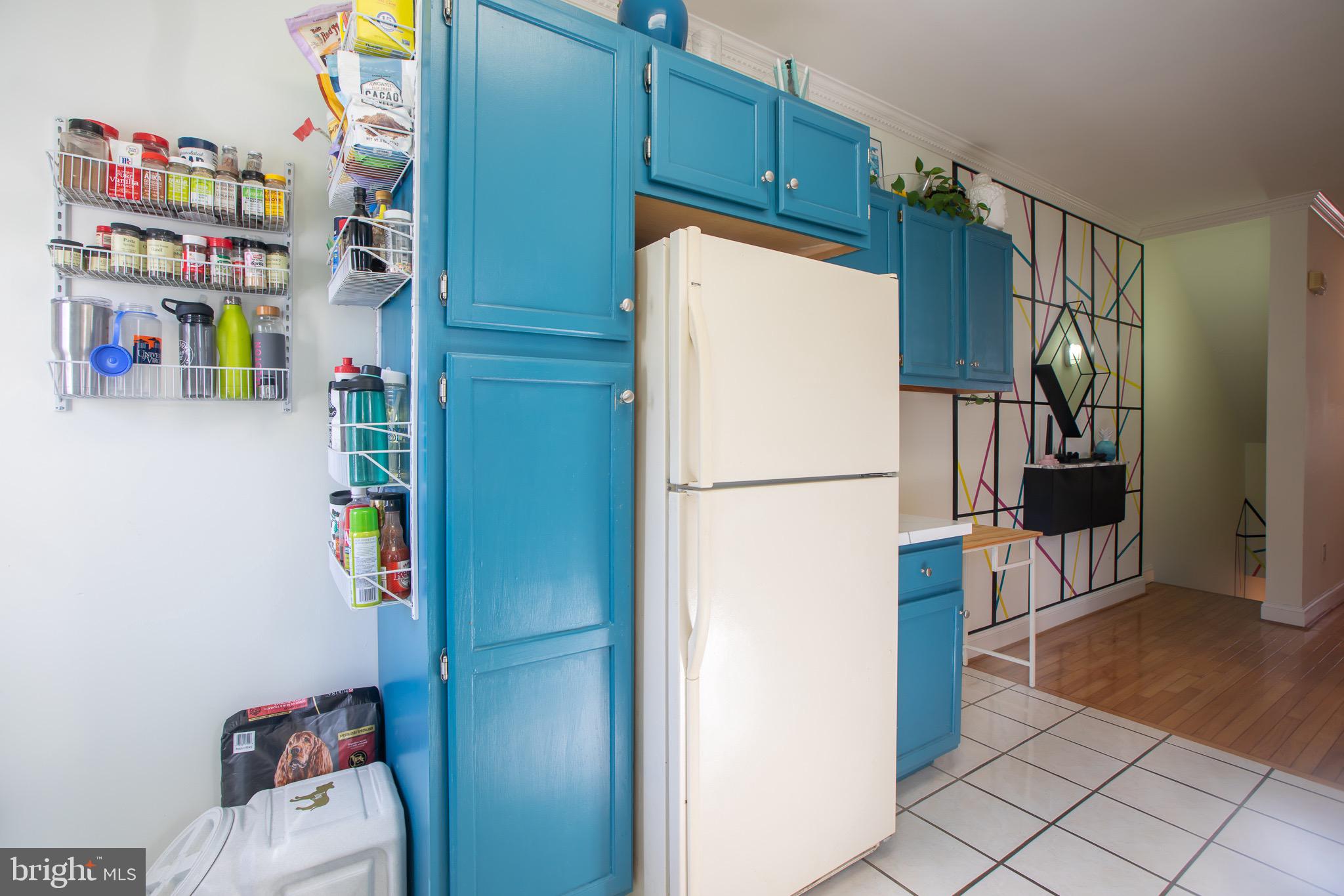 636 Columbia Road Northwest Washington, DC 20001 - Photo 24 of 60 a kitchen with refrigerator and cabinets