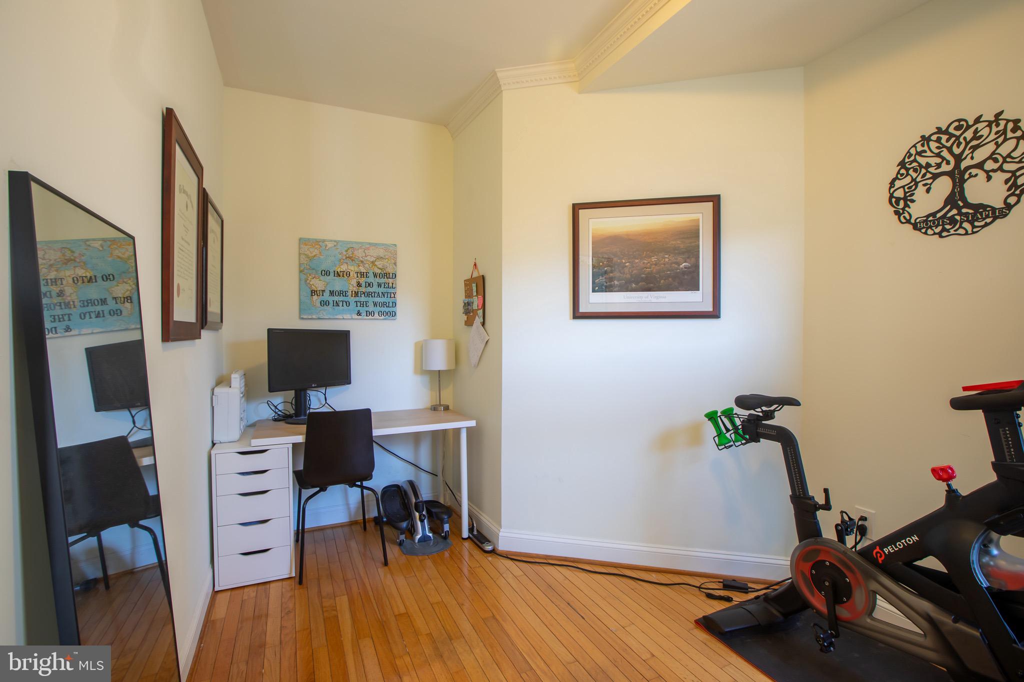 636 Columbia Road Northwest Washington, DC 20001 - Photo 28 of 60 a view of a workspace with furniture and a window