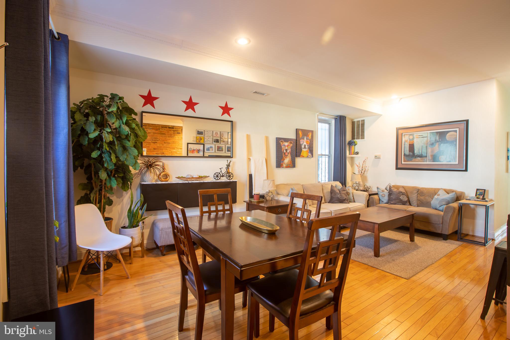 636 Columbia Road Northwest Washington, DC 20001 - Photo 3 of 60 a view of a dining room with furniture