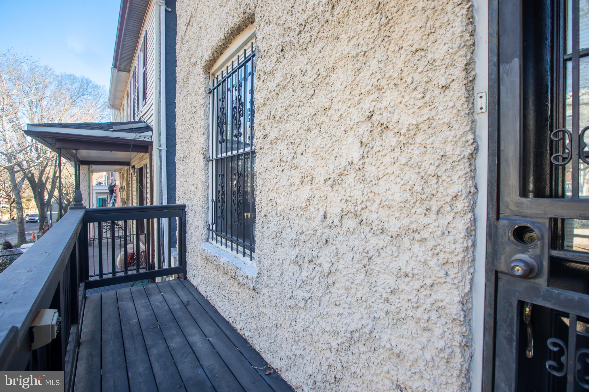 636 Columbia Road Northwest Washington, DC 20001 - Photo 55 of 60 a balcony with wooden floor