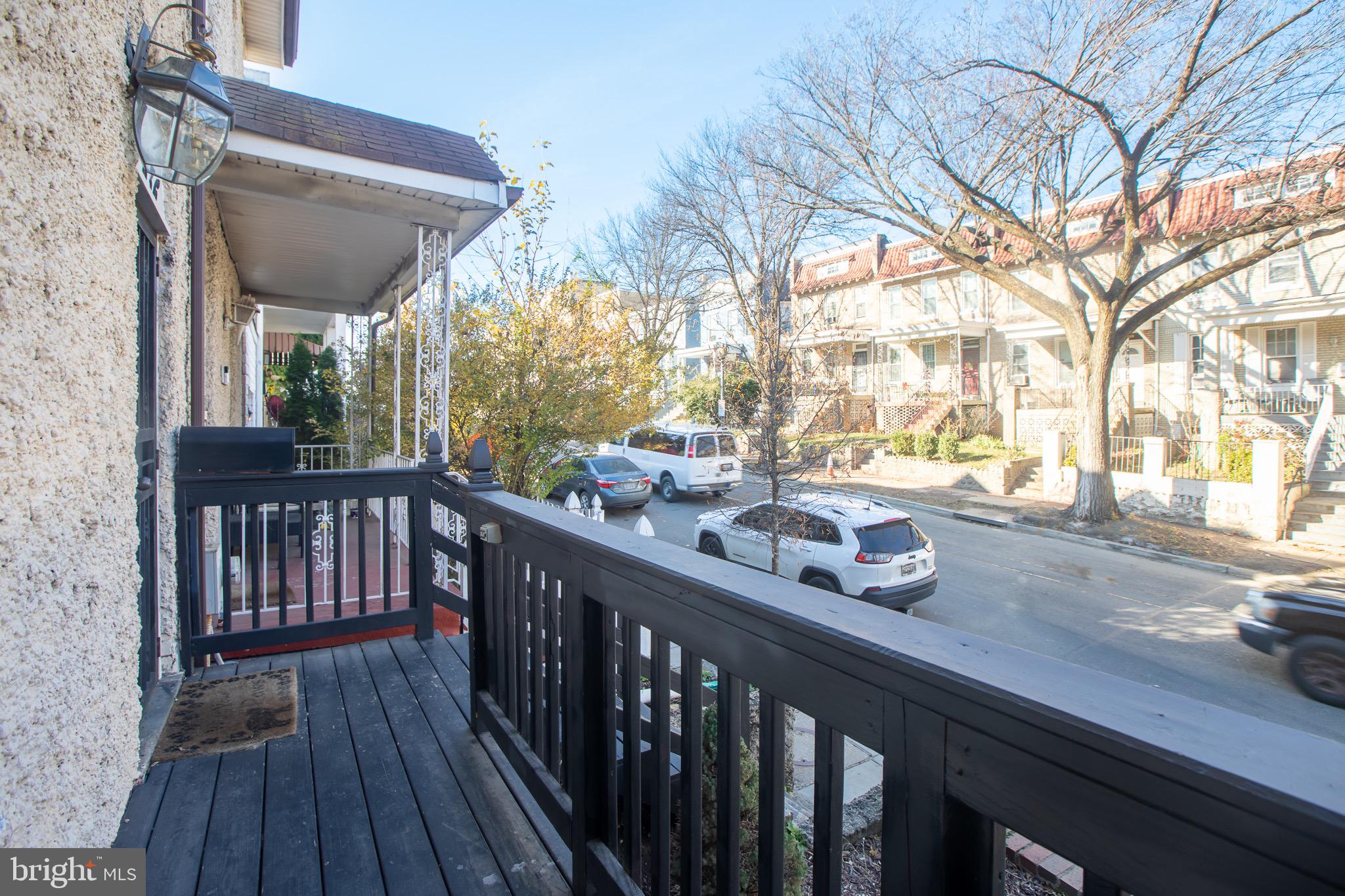 636 Columbia Road Northwest Washington, DC 20001 - Photo 56 of 60 a view of a balcony with wooden floor