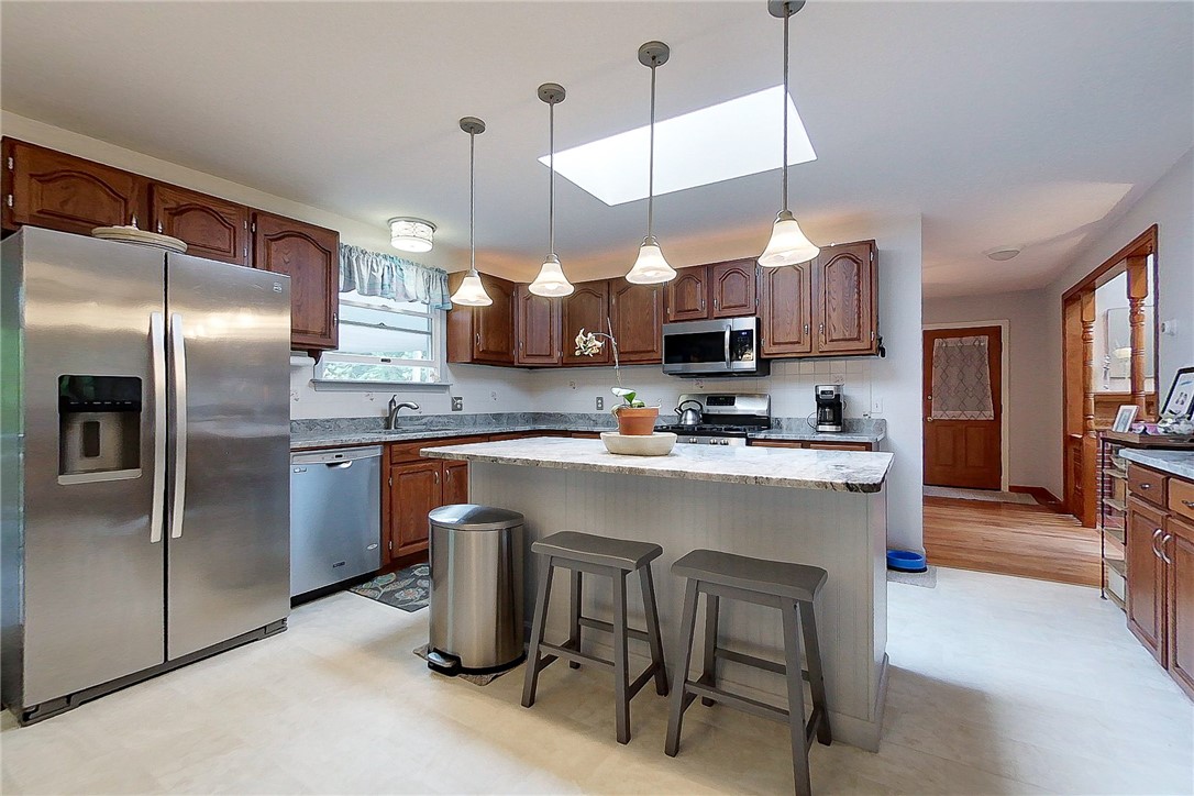 50 Sheffield Hill Road Exeter, RI 02822 - Photo 12 of 50 Kitchen Island and Lighting Create Intimate Atmosphere
