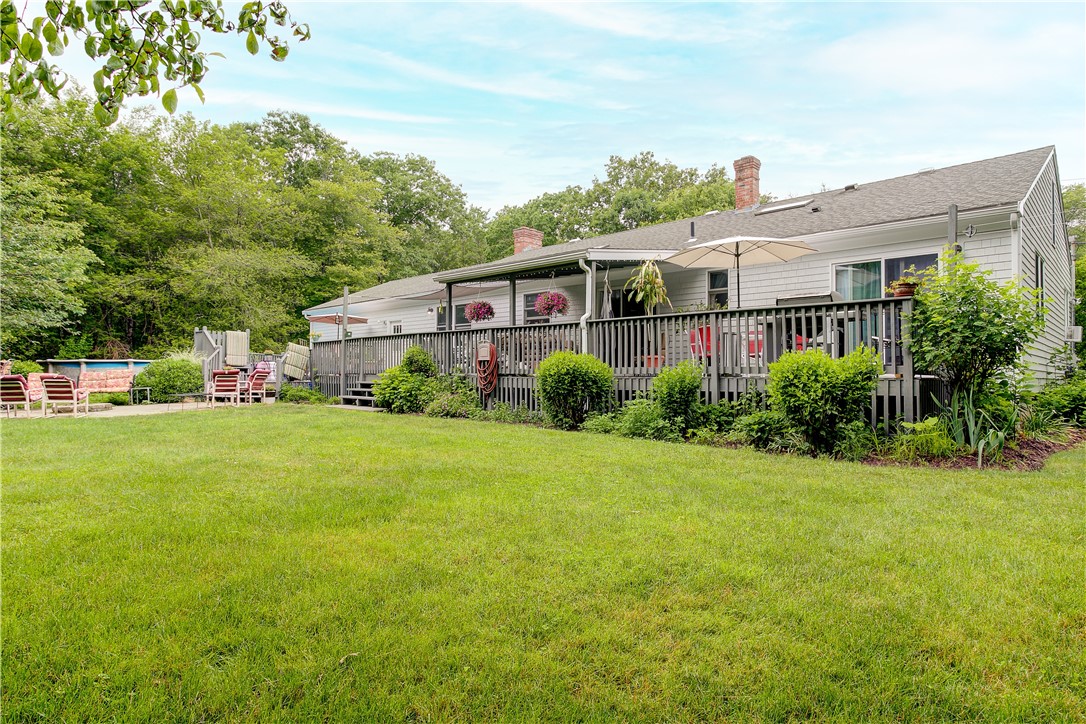 50 Sheffield Hill Road Exeter, RI 02822 - Photo 2 of 50 Back Exterior from Expansive Back Lawn
