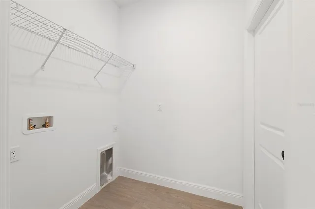 a view of a room with racks on the wall