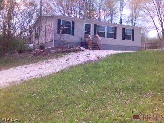1771 Notman Road Deerfield, OH 44411 - Photo 1 of 1 front view of home from bottom of the hill. Both a circular & straight driveway