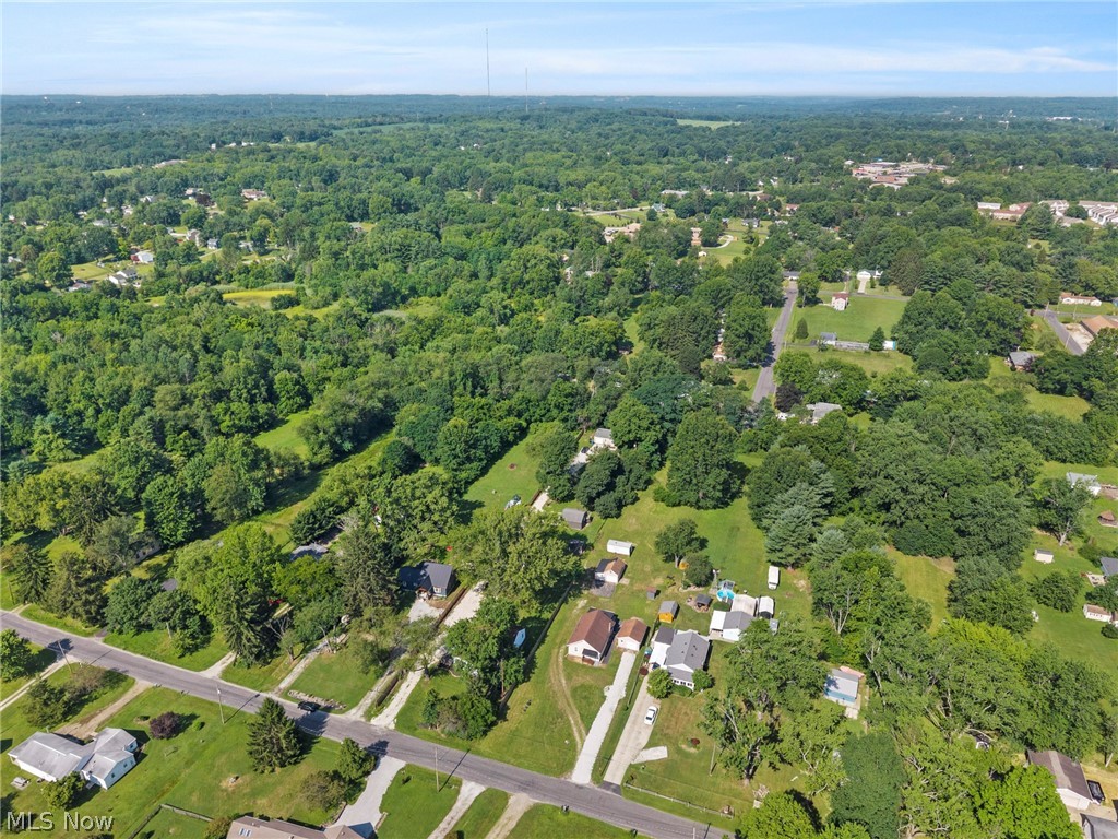 1218 Briggle Road Akron, OH 44320 - Photo 35 of 40 Expansive aerial view showcasing a verdant landscape with abundant mature trees and residential properties