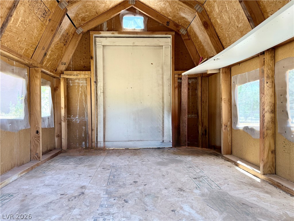 1220 East Gamebird Road Pahrump, NV 89048 - Photo 41 of 49 A rustic wood-framed Chicken coop or small storage shed.