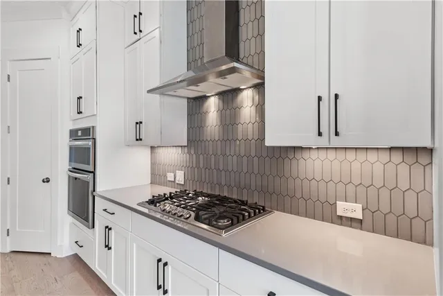 a view of a patio with wooden floor