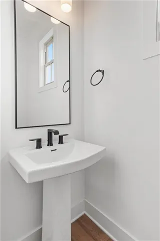 a bedroom with a bed and a desk