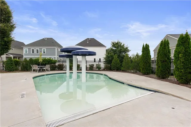 a view of a livingroom with furniture and a window