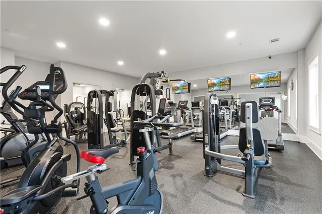 a view of a brick building with many windows