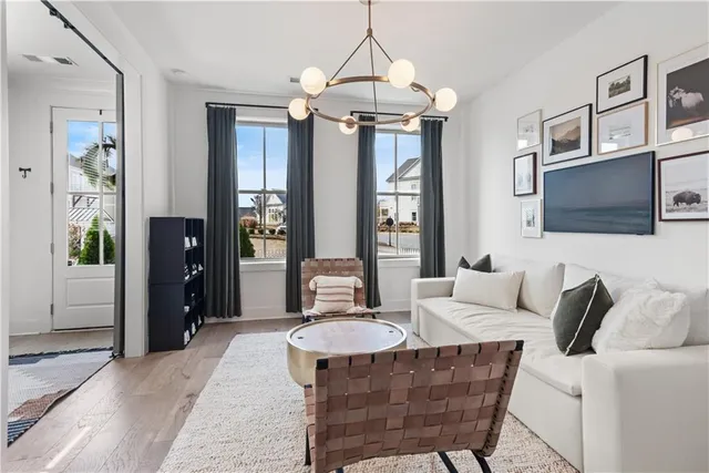 a living room with furniture and a window