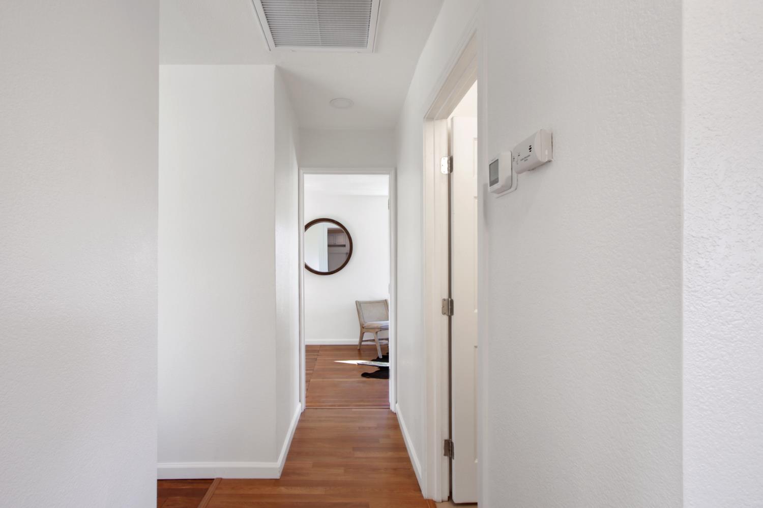 2905 Wood Street Placerville, CA 95667 - Photo 18 of 41 a view of a hallway with wooden floor