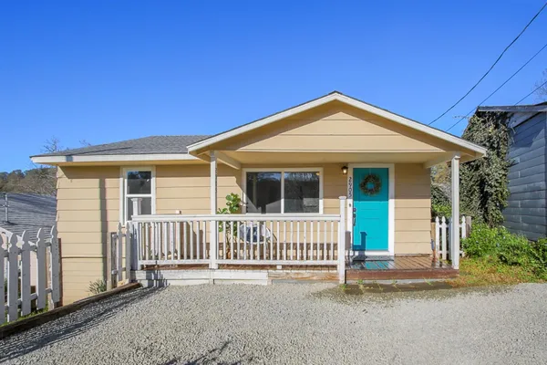 a front view of a house with porch
