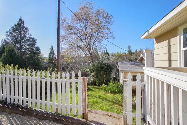 a view of a wooden fence
