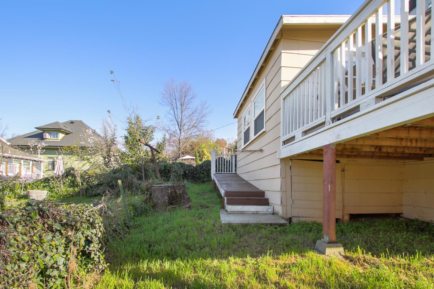 2905 Wood Street Placerville, CA 95667 - Photo 36 of 41 a view of a house with a yard and plants