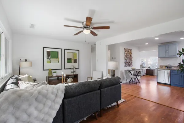 a living room with furniture and a window