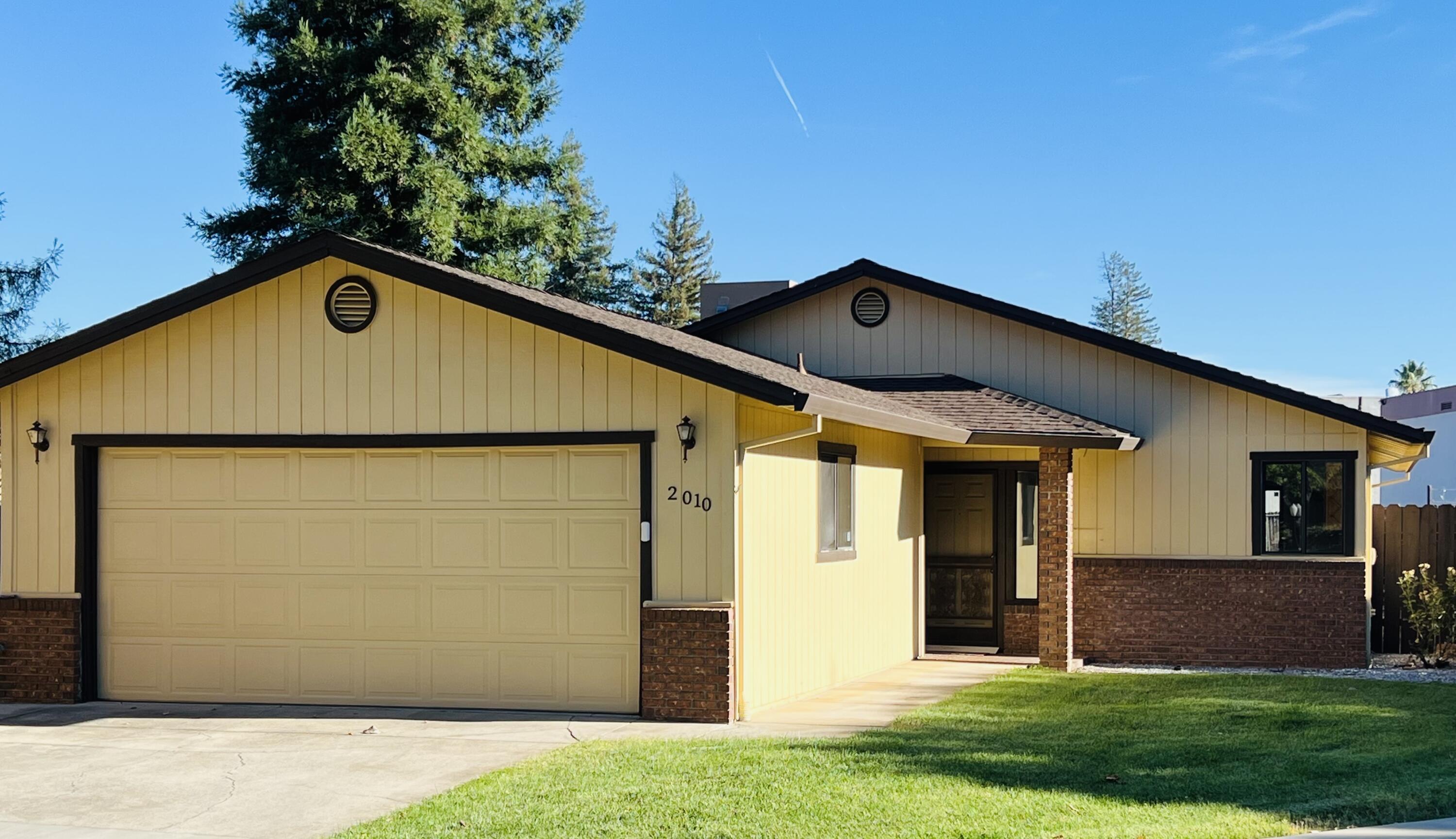 2010 Lazare Path Redding, CA 96001 - Photo 1 of 25 a front view of a house with a yard