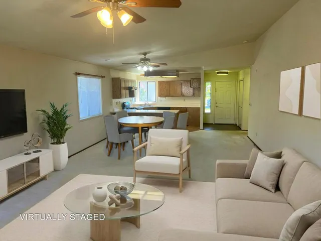 a kitchen with a sink cabinets and window