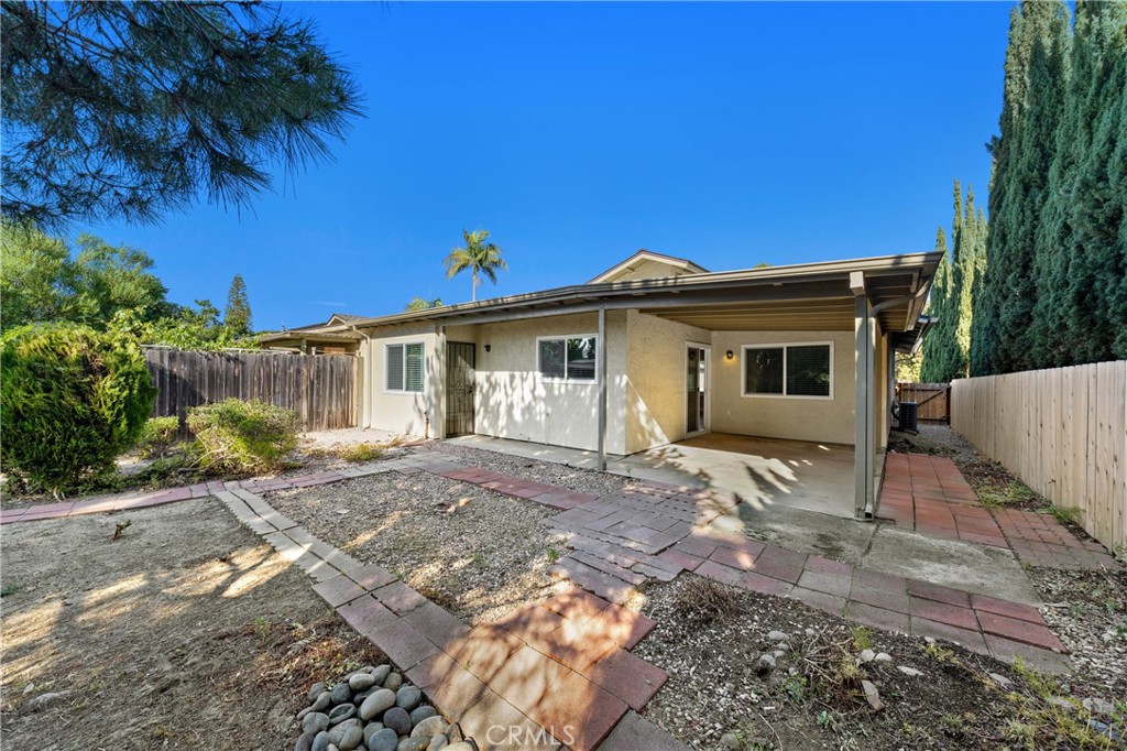 1413 Panorama Ridge Road Oceanside, CA 92056 - Photo 27 of 27 a view of a house with a yard
