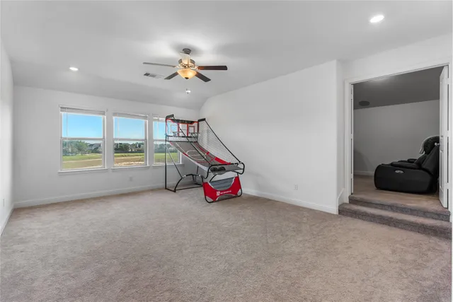 a living room with a couch and a flat screen tv