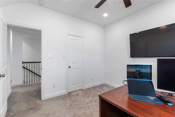 a workspace with furniture and wooden floor