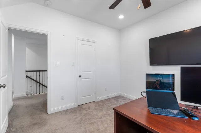 a workspace with furniture and wooden floor