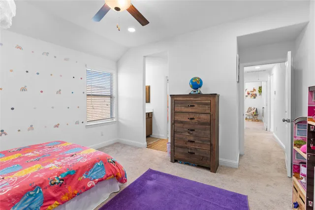 a bedroom with a bed and a closet