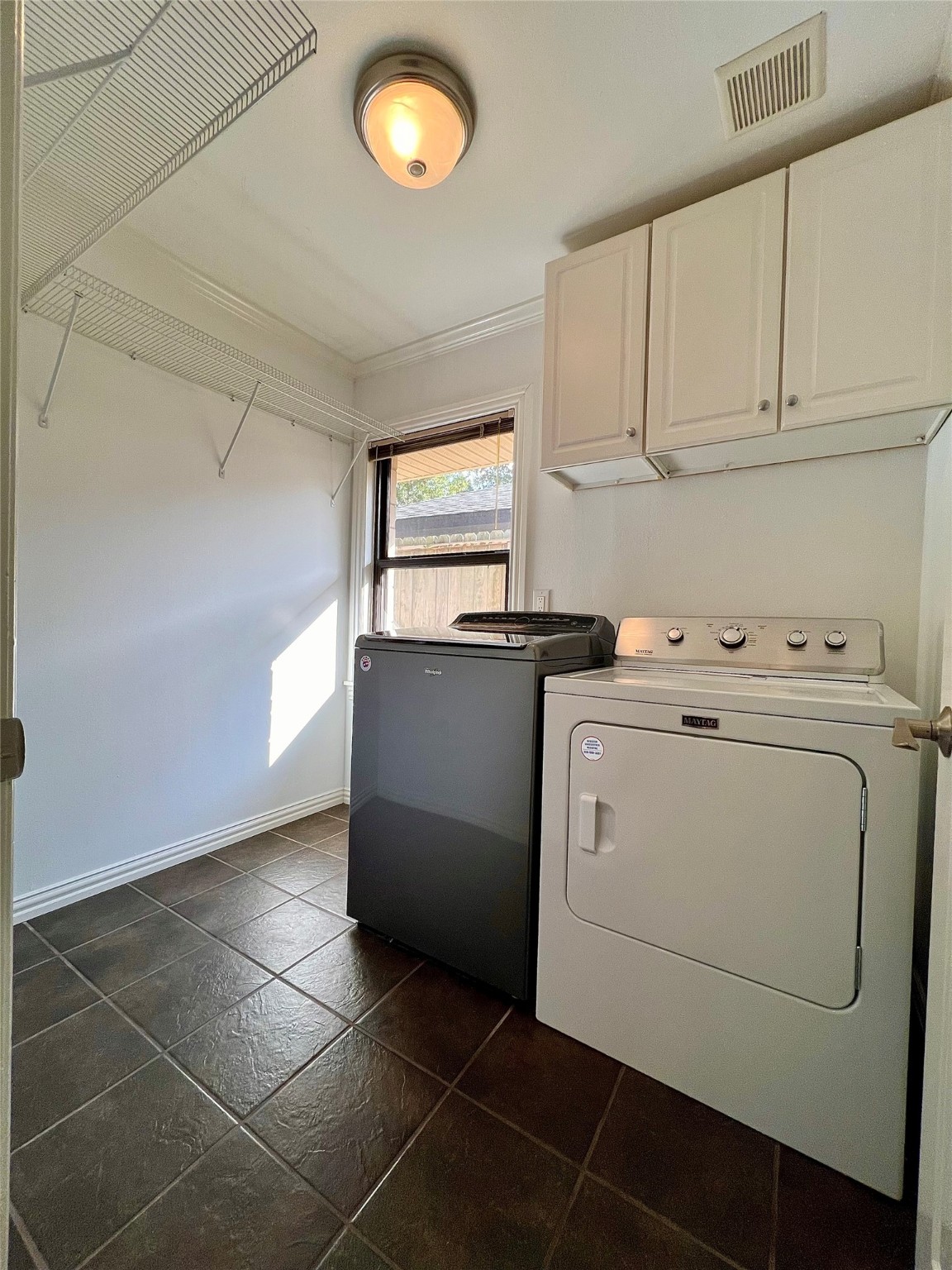 4218 Glebe Road Houston, TX 77018 - Photo 12 of 26 a utility room with dryer and washer