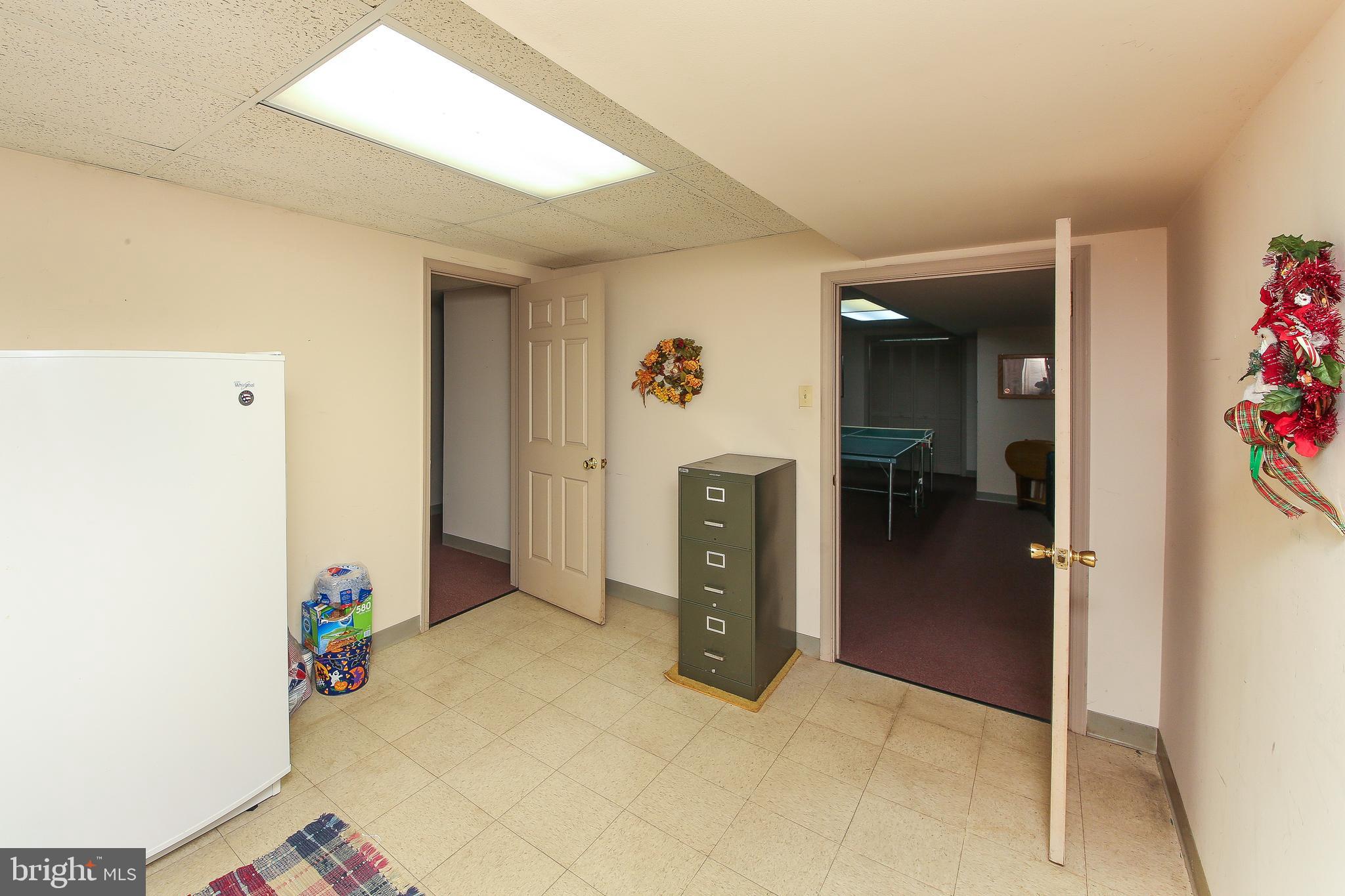 220 Woodhill Road Newtown, PA 18940 - Photo 24 of 28 Basement storage