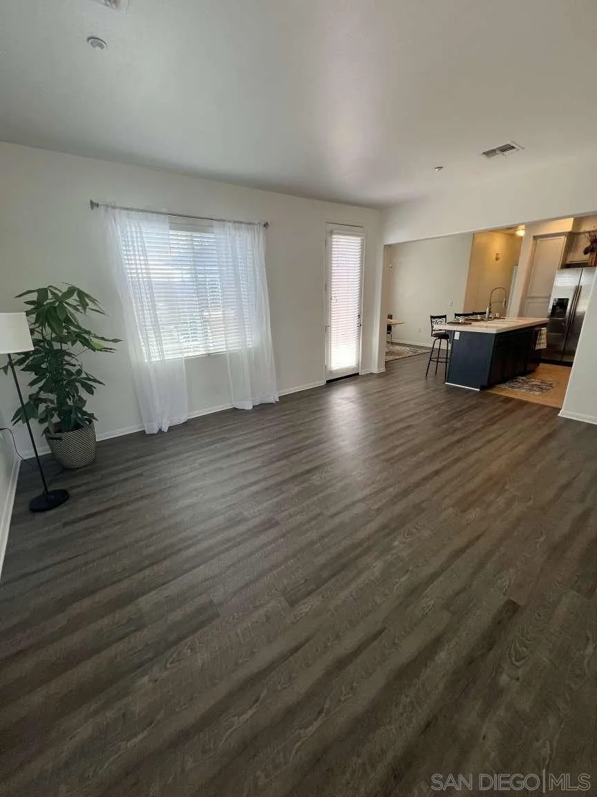 362 Borden Road San Marcos, CA 92069 - Photo 5 of 23 a view of empty room with wooden floor