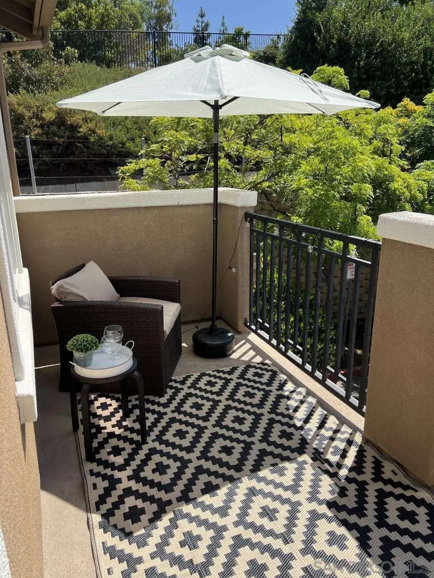 362 Borden Road San Marcos, CA 92069 - Photo 6 of 23 a table and chairs in a balcony