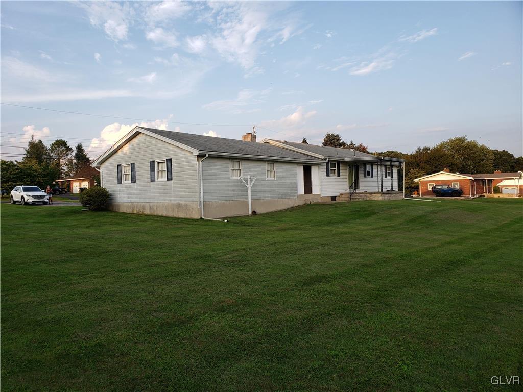 2341 Yost Road Bath, PA 18014 - Photo 4 of 24 a view of a house with a big yard and large trees
