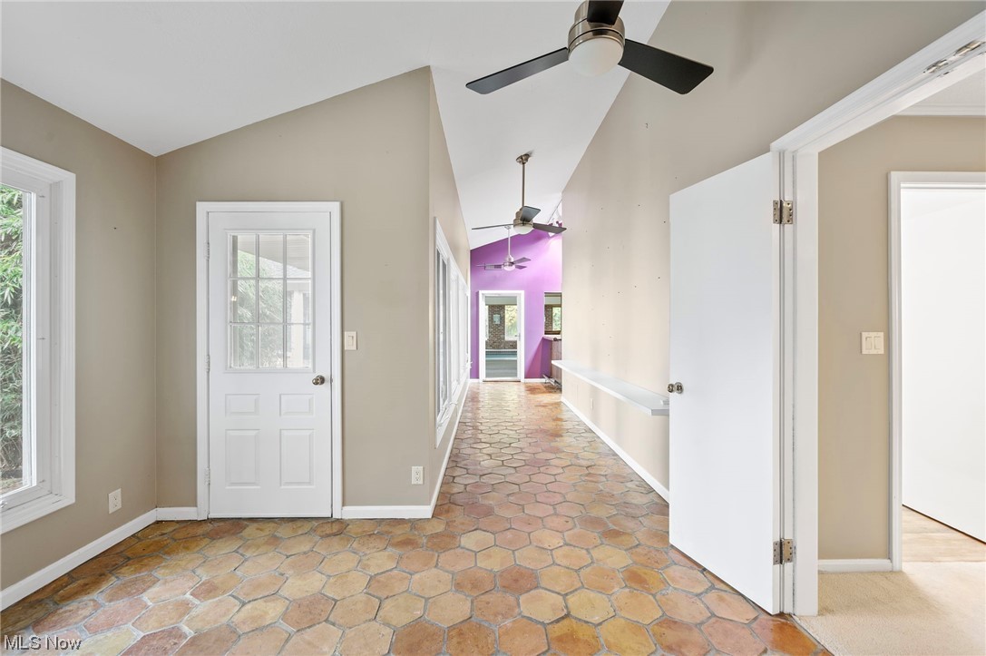 29475 Bolingbrook Road Pepper Pike, OH 44124 - Photo 24 of 49 Breezeway to the pool from the main house, bar area at the end. Access to the courtyard.