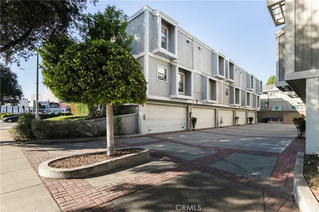 a front view of a building with street view
