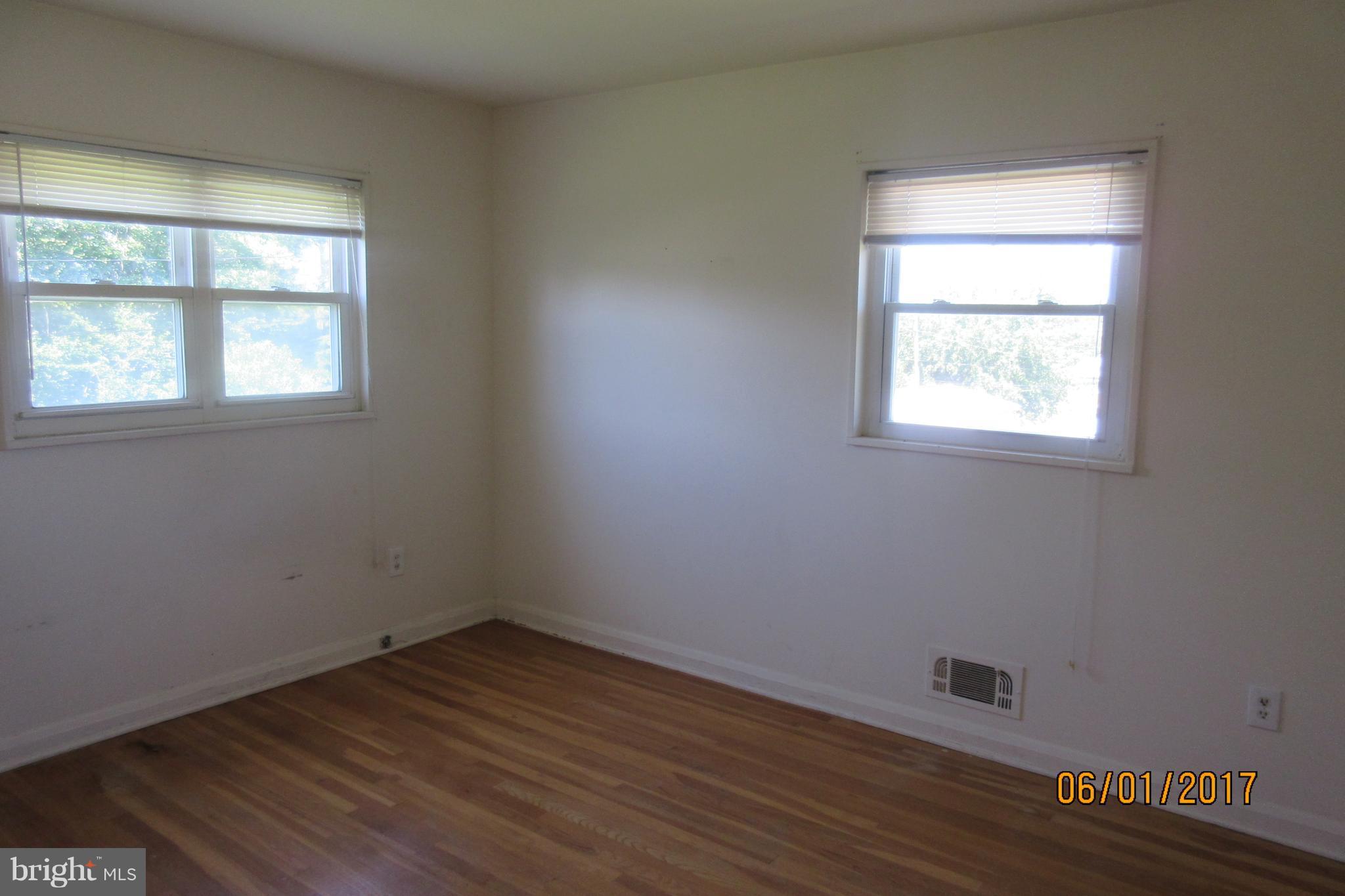 6209 Johnnycake Road Baltimore, MD 21207 - Photo 15 of 15 an empty room with a window