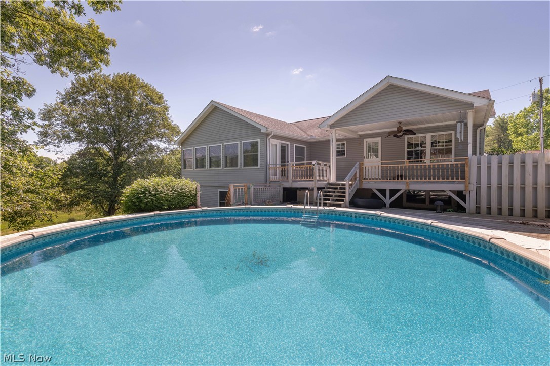3963 Mark Road Cambridge, OH 43725 - Photo 47 of 50 View of swimming pool with a wooden deck