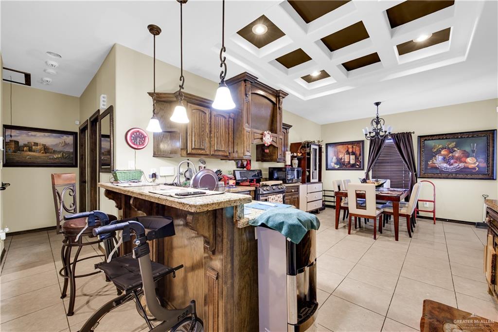 814 West 2nd Street Mission, TX 78572 - Photo 13 of 25 a view of a kitchen and dining area