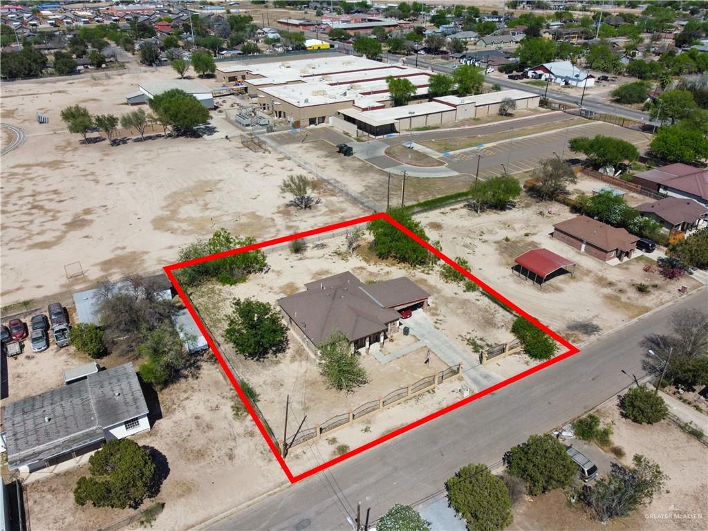 814 West 2nd Street Mission, TX 78572 - Photo 17 of 25 an aerial view of a tennis ground and a buildings