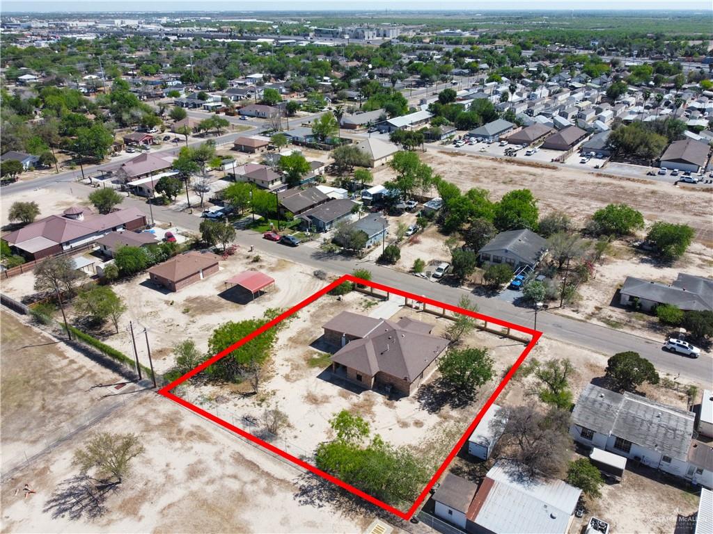814 West 2nd Street Mission, TX 78572 - Photo 24 of 25 an aerial view of residential houses with outdoor space