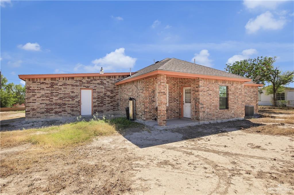 814 West 2nd Street Mission, TX 78572 - Photo 3 of 25 a view of a house with a yard
