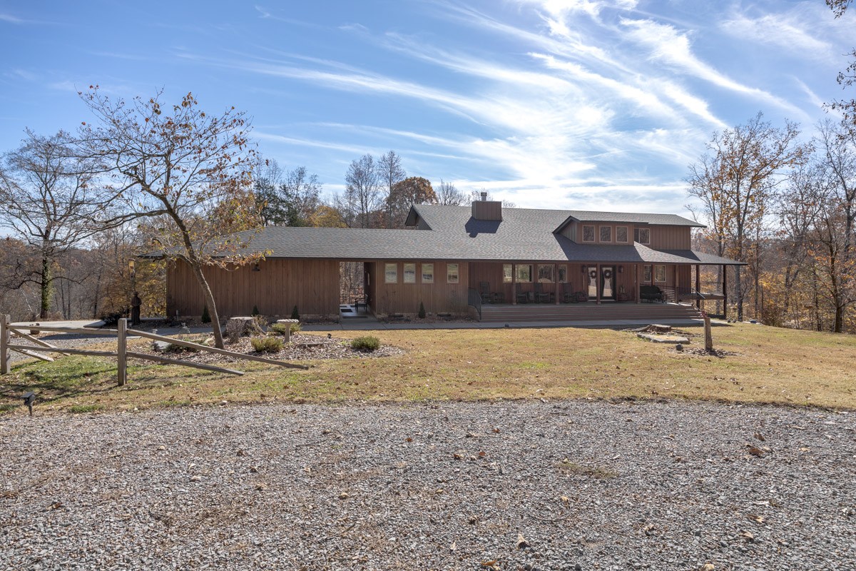2900 Tanyard Hill Road Lynchburg, TN 37352 - Photo 2 of 83 a view of a house with a yard and a large tree